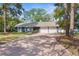 Beautiful single-story home with a wide driveway and two-car garage at 1267 Meredith Dr, Spring Hill, FL 34608