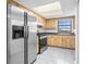 Functional kitchen with stainless steel refrigerator and appliances at 1267 Meredith Dr, Spring Hill, FL 34608