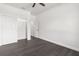 A bright bedroom with a closet offering ample storage and convenience at 16043 Penn State Rd, Weeki Wachee, FL 34614
