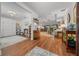 Inviting living area with hardwood floors, custom built-ins, and plenty of natural light at 16386 Heron Hills Dr, Spring Hill, FL 34610