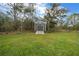View of a shed with a ramp providing easy access for storage at 16386 Heron Hills Dr, Spring Hill, FL 34610