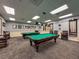 Inviting community billiard room featuring well-maintained pool tables and recreational setting at 18045 Tarrington Pl, Hudson, FL 34667