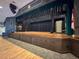 Community stage featuring velvet curtains, hardwood flooring, and performance-ready setting at 18045 Tarrington Pl, Hudson, FL 34667