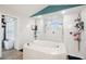 Luxurious bathroom showcasing a walk-in shower, soaking tub, and elegant fixtures at 18317 Treehaven Dr, Hudson, FL 34667