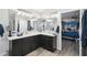 Dual vanity bathroom featuring and sinks and access to the bedroom at 18317 Treehaven Dr, Hudson, FL 34667