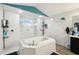 Bathroom showcasing soaking tub, walk-in shower and modern fixtures and stepped wall design at 18317 Treehaven Dr, Hudson, FL 34667