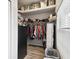 Walk-in closet offers ample storage with shelves and hanging space for organization at 18317 Treehaven Dr, Hudson, FL 34667