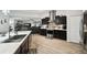 Kitchen featuring stainless steel appliances, modern cabinets, marble countertops, and open layout at 18317 Treehaven Dr, Hudson, FL 34667