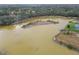 Aerial view of the beautiful lake next to the home at 18317 Treehaven Dr, Hudson, FL 34667