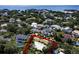 An aerial view of a neighborhood with lush landscaping showing location of the home and surrounding properties at 2606 S Hawthorne Cir, Tampa, FL 33629