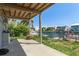 Relaxing back porch offering serene waterfront views and an outdoor living space at 4046 Casa Ct, Hernando Beach, FL 34607