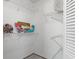 Storage closet with wire shelving and decorative mermaid at 4046 Casa Ct, Hernando Beach, FL 34607