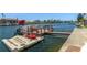 Waterfront dock featuring boat access and kayak, offering endless water activities at 4046 Casa Ct, Hernando Beach, FL 34607