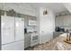 Charming kitchen features updated appliances, granite countertops, and ample storage at 4046 Casa Ct, Hernando Beach, FL 34607