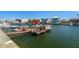 Serene waterfront view featuring a private dock, boat access, and outdoor water activities at 4046 Casa Ct, Hernando Beach, FL 34607