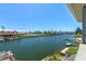 Beautiful waterfront view showcasing serene waters and surrounding neighborhood homes on a sunny day at 4046 Casa Ct, Hernando Beach, FL 34607