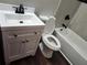 Bathroom featuring a modern vanity, white fixtures, and a combined shower and tub at 4601 N 37Th St, Tampa, FL 33610