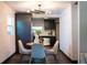 Cozy dining area with modern lighting and easy access to the kitchen at 4601 N 37Th St, Tampa, FL 33610