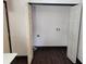 Bright laundry room with washer/dryer hookups and dark wood flooring at 4601 N 37Th St, Tampa, FL 33610
