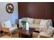 Cozy living room with stylish decor, a comfortable sofa, and decorative wall accents at 4601 N 37Th St, Tampa, FL 33610