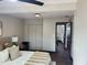 Spacious main bedroom with hardwood floors, double closets, and neutral walls at 4601 N 37Th St, Tampa, FL 33610