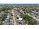 Wide aerial view of a residential neighborhood with tree-lined streets and well-maintained homes at 4743 Foothill Dr, Holiday, FL 34690