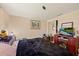Comfortable bedroom with closet, TV, and decor at 4743 Foothill Dr, Holiday, FL 34690
