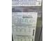Close up of the HVAC label showing the model and serial number at 5211 Wisteria Cir, New Port Richey, FL 34653