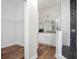 Bathroom with a glass-enclosed shower, double vanity, and walk-in closet at 6514 Grapewood Rd, Spring Hill, FL 34609