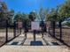 A fenced dog park area with separate entrances for small and large breeds provides exercise for pets at 7215 121St Ter, Largo, FL 33773