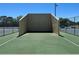 An outdoor racquetball court provides a unique recreational amenity in the neighborhood at 7215 121St Ter, Largo, FL 33773