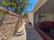 A paved side yard offers access to the backyard, along with potential outdoor lounging and entertainment at 7215 121St Ter, Largo, FL 33773