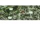 An aerial view shows the property situated in a neighborhood with nearby streets Clover Hill Loop and Hunting Saddle Row at 8501 Hunting Saddle Dr, Hudson, FL 34667