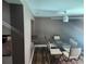 Inviting dining area featuring modern light fixtures, stylish accents, and ample space for entertaining at 8501 Hunting Saddle Dr, Hudson, FL 34667