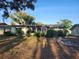 Charming single-story home with well-maintained front yard landscaping at 10803 Hachita Dr, Port Richey, FL 34668