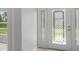 Beautiful foyer features a decorative glass front door at 11192 Kodiak Wren Rd, Weeki Wachee, FL 34614