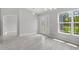 Large room boasts modern tile, glass paneled doors and a window for lots of natural light at 11192 Kodiak Wren Rd, Weeki Wachee, FL 34614