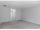 Bright bedroom with neutral carpet, white walls and trim, and recessed lighting at 11388 Paramount Ave, Weeki Wachee, FL 34614