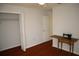 A bright, sunny bedroom with a spacious closet and a vintage sewing machine at 11480 Emerald Ridge Ct, Spring Hill, FL 34609