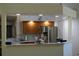 Renovated kitchen with modern countertops, stainless steel appliances, and an open layout for easy entertaining at 11480 Emerald Ridge Ct, Spring Hill, FL 34609
