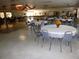 Spacious banquet hall with round tables and chairs, ideal for events and gatherings at 11917 Bayonet Ln # 11917, New Port Richey, FL 34654