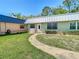 Well-maintained one-story home with lush green lawn and basic landscaping at 11917 Bayonet Ln # 11917, New Port Richey, FL 34654