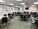 Game room featuring card tables and chairs, creating a fun and social atmosphere at 11917 Bayonet Ln # 11917, New Port Richey, FL 34654