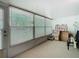 Enclosed lanai featuring lots of light and a door to access the outside at 11917 Bayonet Ln # 11917, New Port Richey, FL 34654