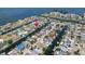 Stunning aerial view of waterfront neighborhood with canal access and boats docked at private residences at 13610 Claudia Dr, Hudson, FL 34667