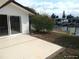 Backyard with patio, lush landscaping and canal views, close to the dock at 13610 Claudia Dr, Hudson, FL 34667