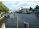 Picturesque canal view with docks, boats, and waterfront homes, perfect for boating enthusiasts at 13610 Claudia Dr, Hudson, FL 34667