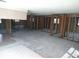 Open living area showcasing framing ready for your personalized design at 13610 Claudia Dr, Hudson, FL 34667