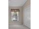 Bedroom with window and closet at 13643 Pimberton Dr, Hudson, FL 34669