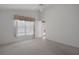 Bedroom with window overlooking the pool at 13643 Pimberton Dr, Hudson, FL 34669